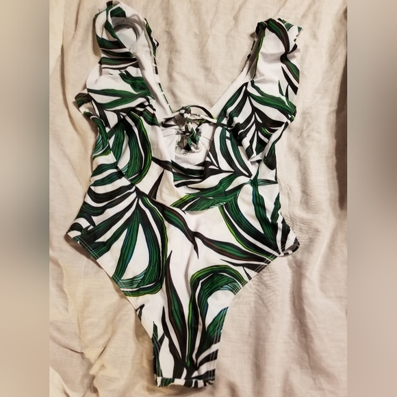 Nwt sexy low cut front and back tie back high cut one piece. Wide straps - Picture 7 of 10